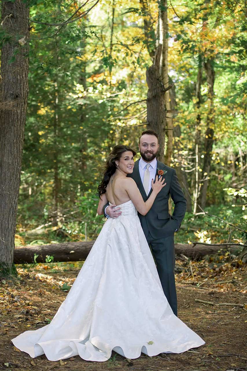 Bride and groom photographed by a professional wedding photographer in Massachusetts